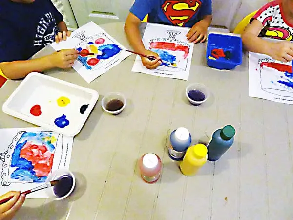 Home Daycare Newmarket | ECE-Led Care | Diana Daycare 6 Children painting and creating crafts at Diana Daycare