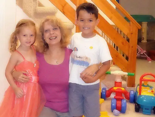 Daycare educator with children at Diana Daycare A daycare educator spending time with children at Diana Daycare.